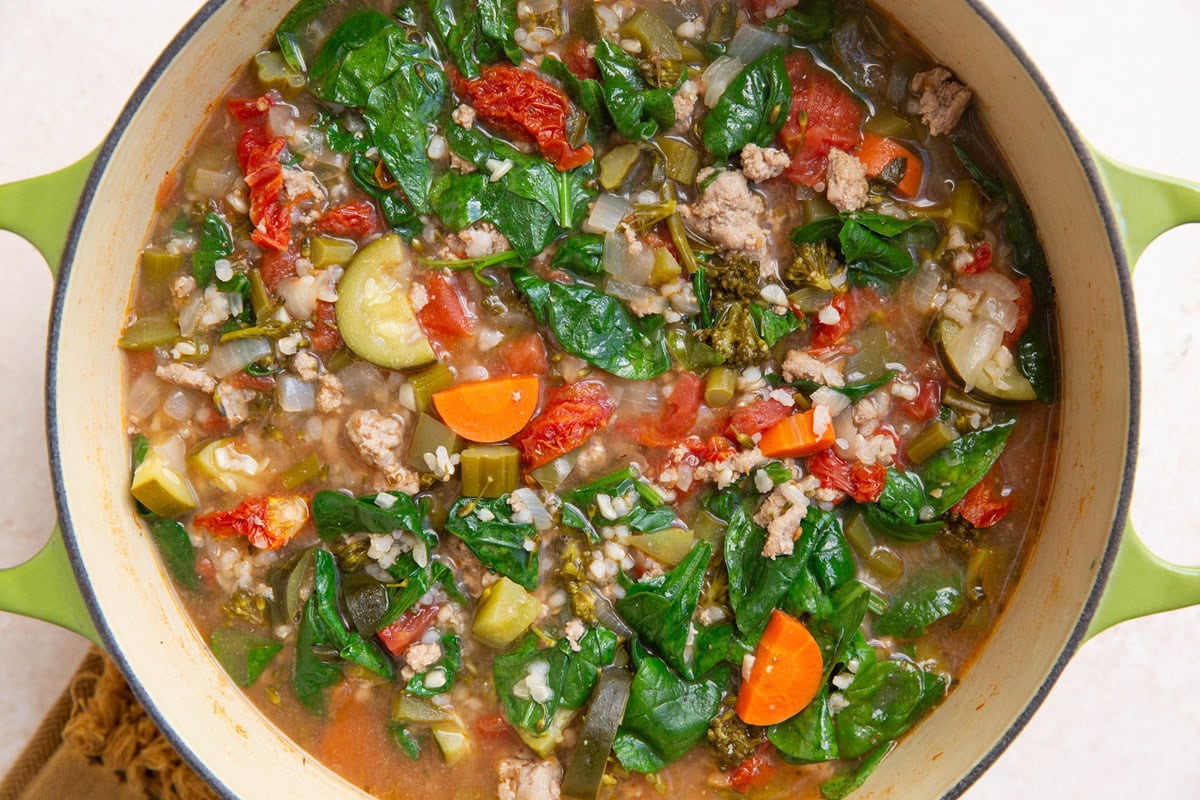 Ground turkey soup with rice in a Dutch oven, freshly made and ready to serve.