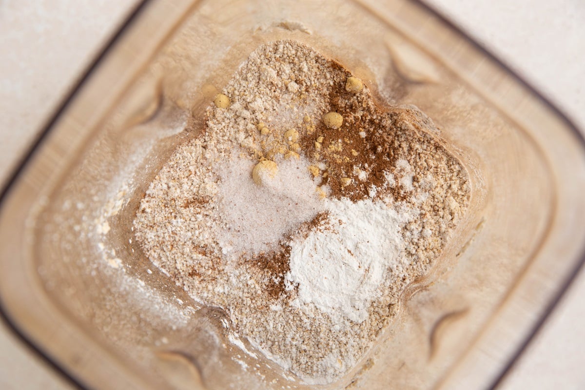 Dry ingredients in a blender, ready to be made into bread.