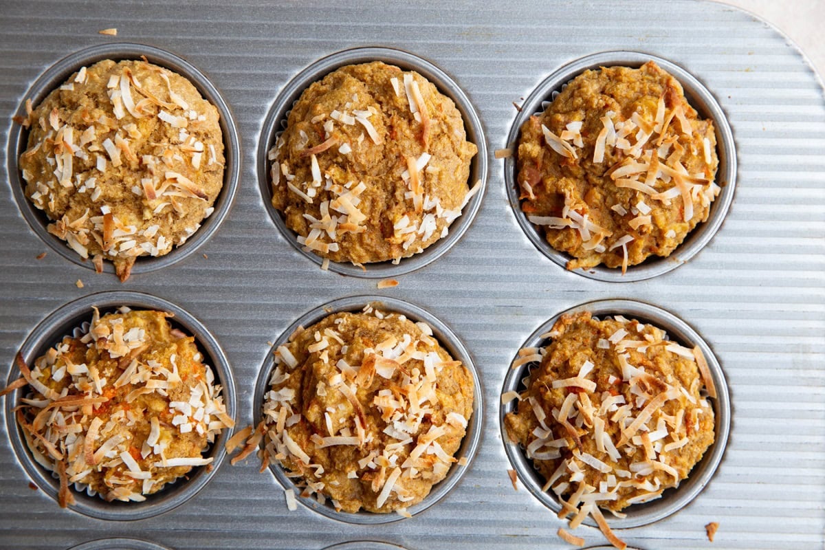 Muffins in a muffin tray, ready to eat.