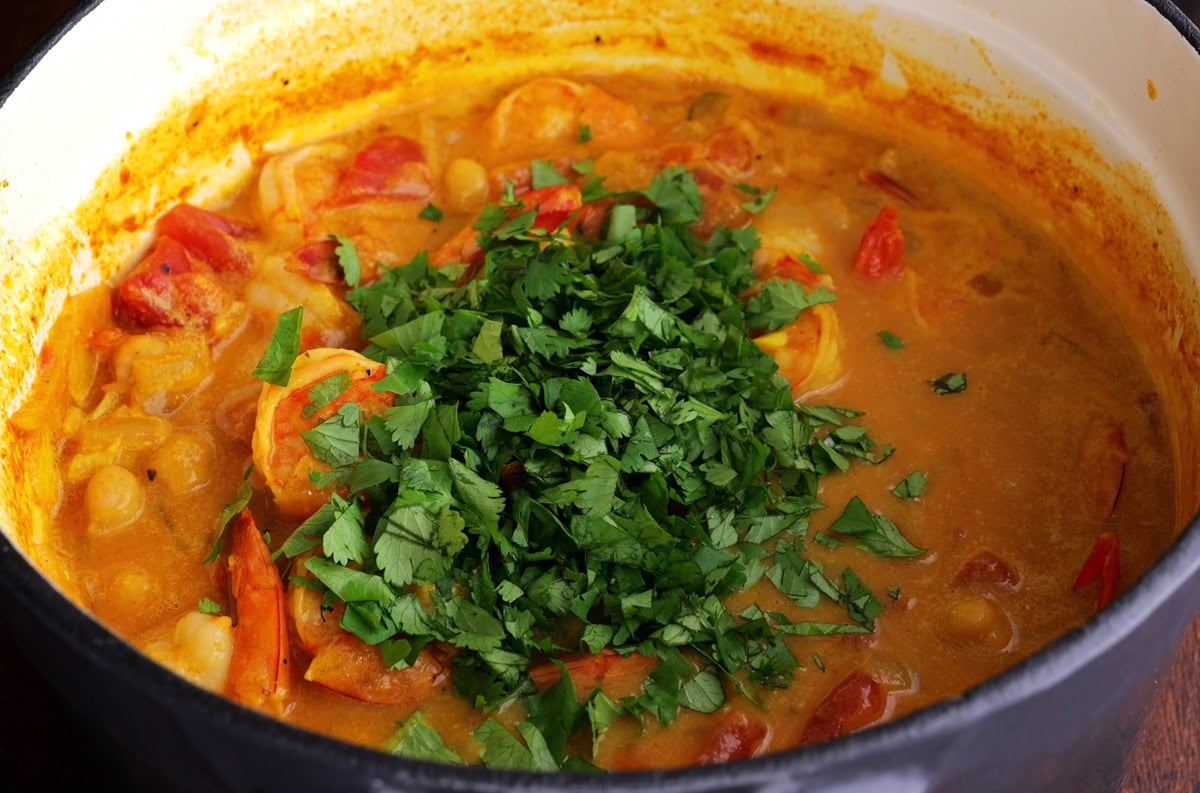 Fresh cilantro on top of shrimp curry.