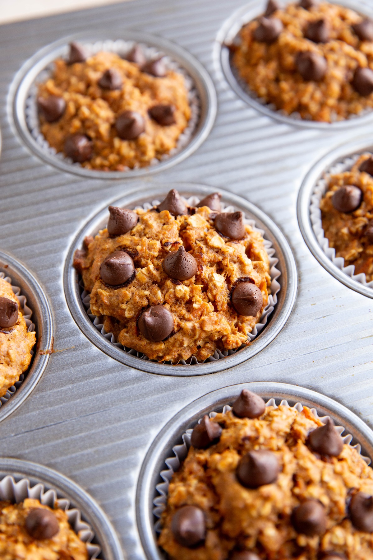 Muffin tray of baked sweet potato muffin cups.