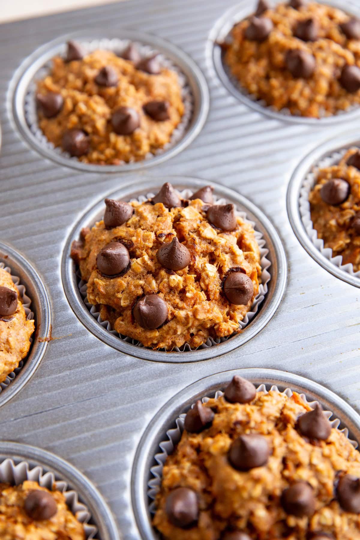 Muffin tray of baked sweet potato muffin cups.