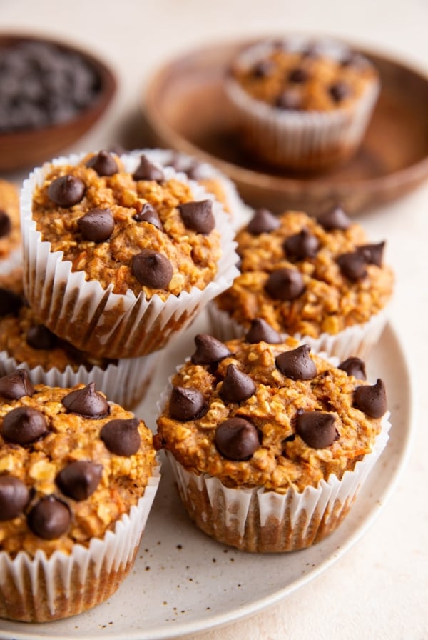 Plate stacked with sweet potato muffins, ready to eat.