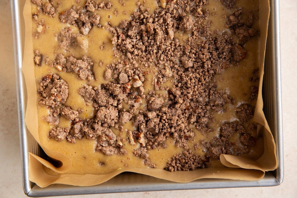 Baking dish with lemon coffee cake ingredients inside, ready to go into the oven.