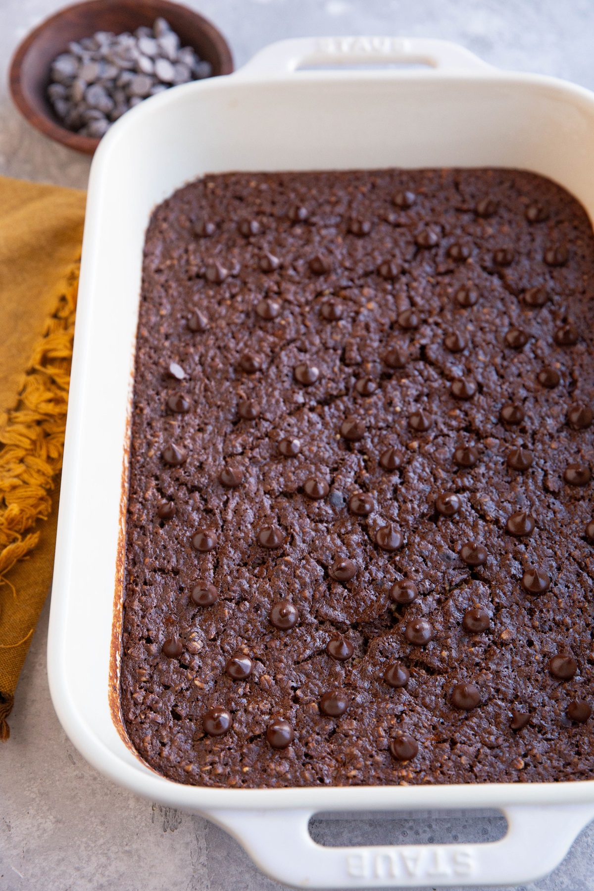 Baking dish with chocolate protein oats, fresh out of the oven.