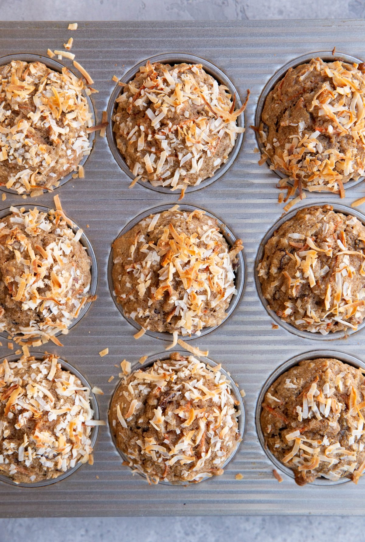 Carrot cake muffins in a muffin tray