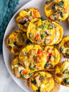 Sausage egg muffins on a plate.