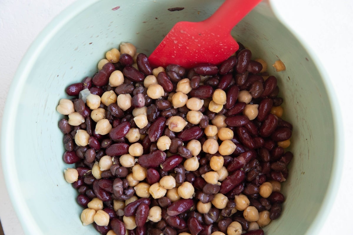 Mixing bowl with beans all mixed together and ready to serve as a side dish.