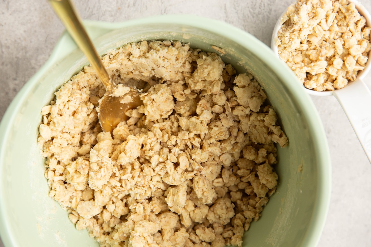 Shortbread crust and crumb topping mixture in a mixing bowl.