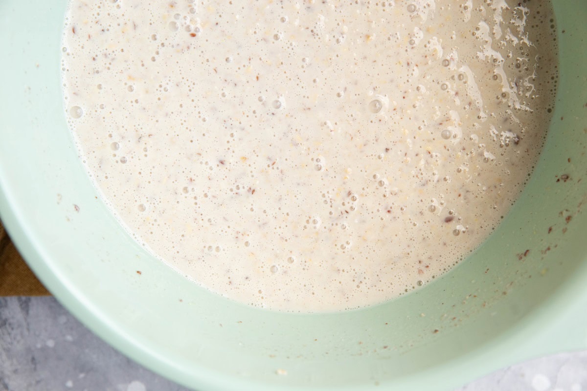 Overnight oats in a mixing bowl after sitting overnight.