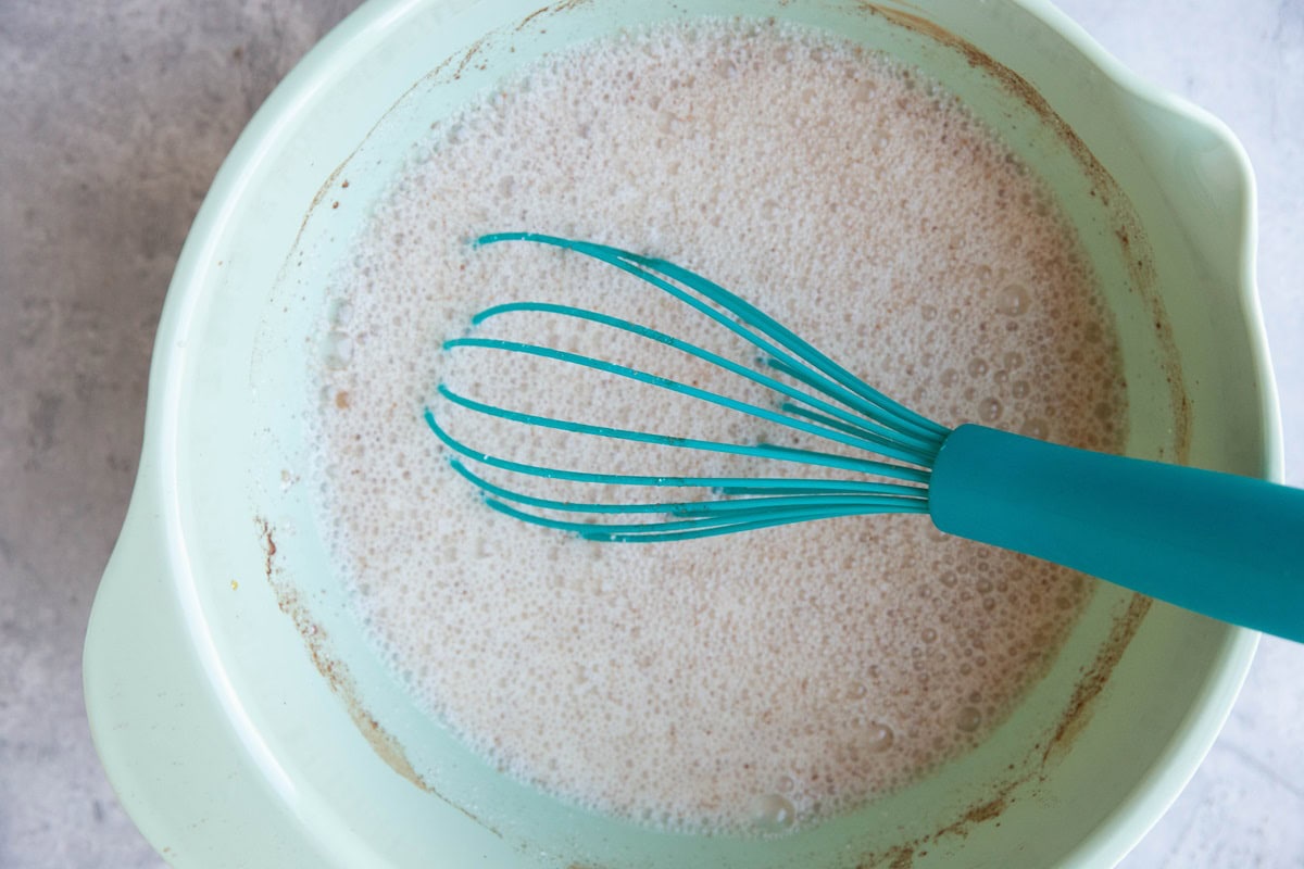 Wet ingredients for protein overnight oats in a mixing bowl.