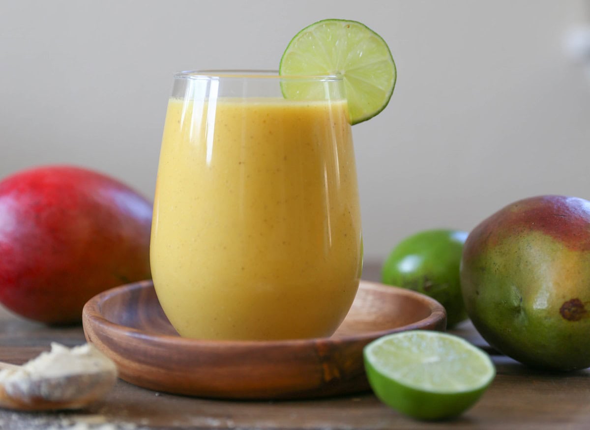 Tropical smoothie in a glass with a slice of lime