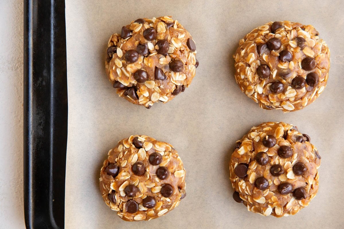 Baking sheet with cookie dough on top, ready to bake.