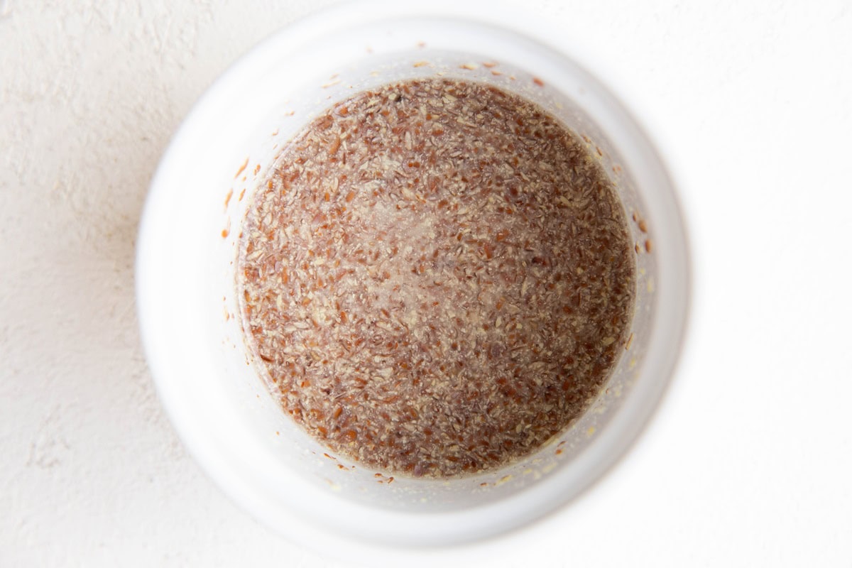 Flax eggs in a small bowl, ready to be used in cookies.