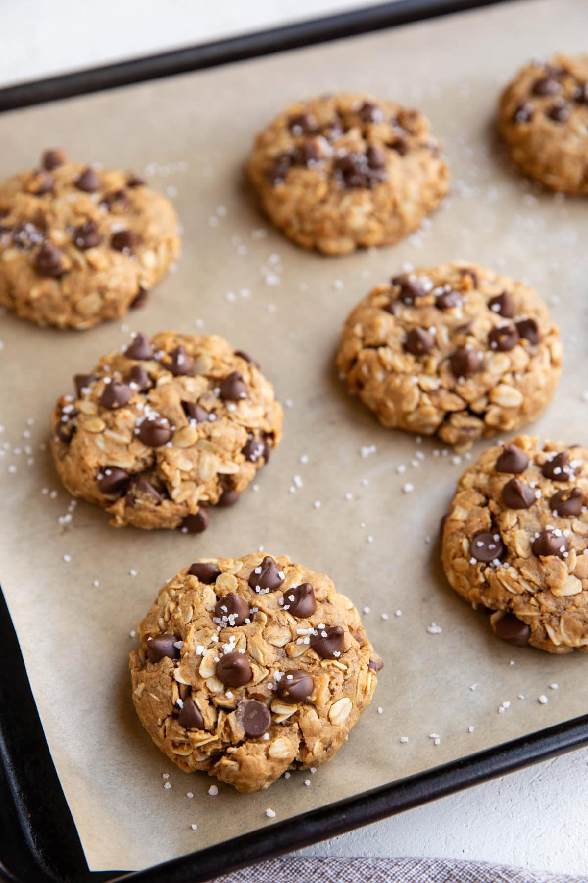 Baking sheet with vegan peanut butter cookies on top.