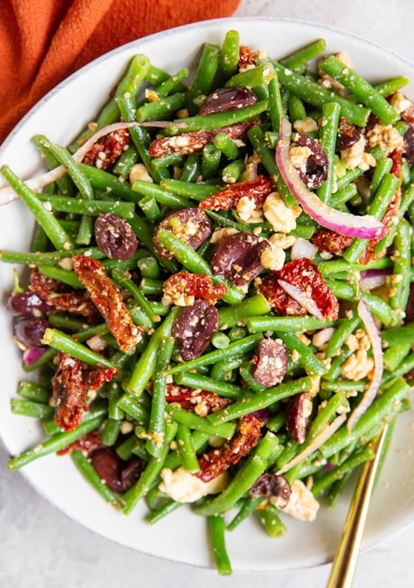 White bowl of green bean salad