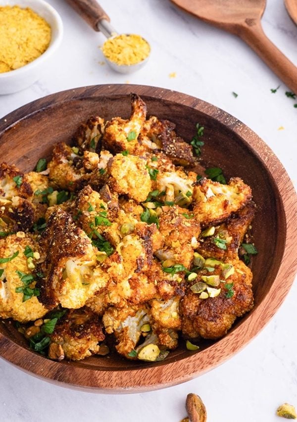 Wooden bowl of roasted cauliflower