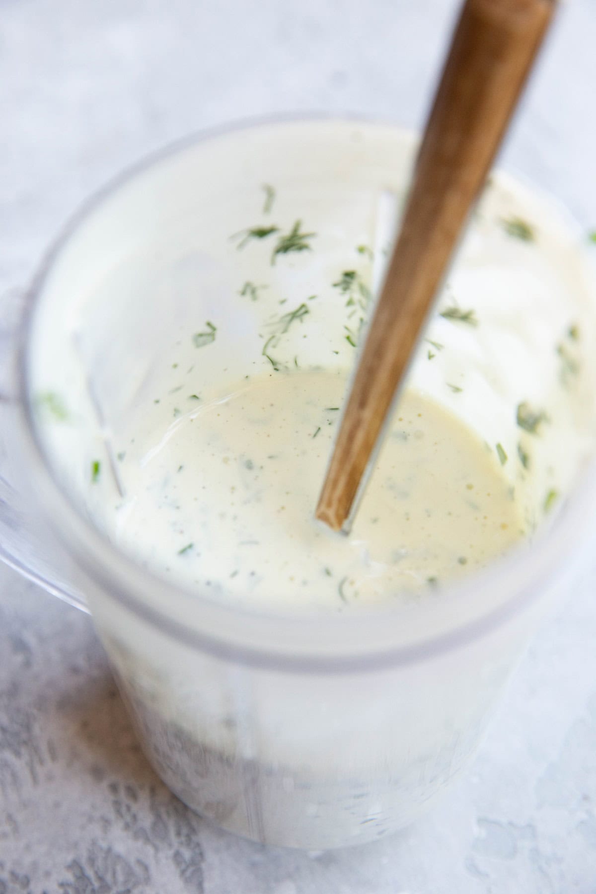 Small blender full of ranch dressing.