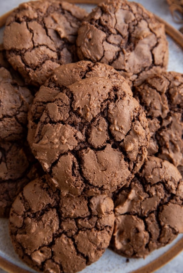 Plate of fudge brownie cookies in a stack.