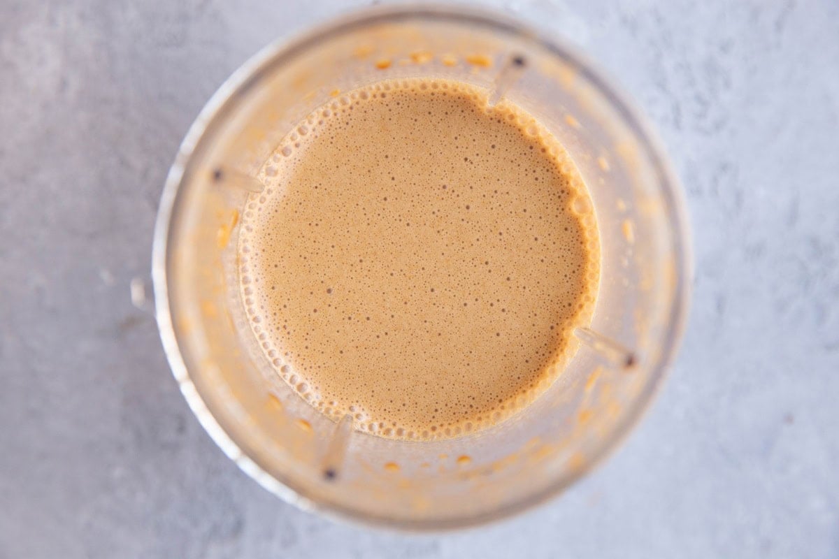 Small blender full of stir fry sauce.