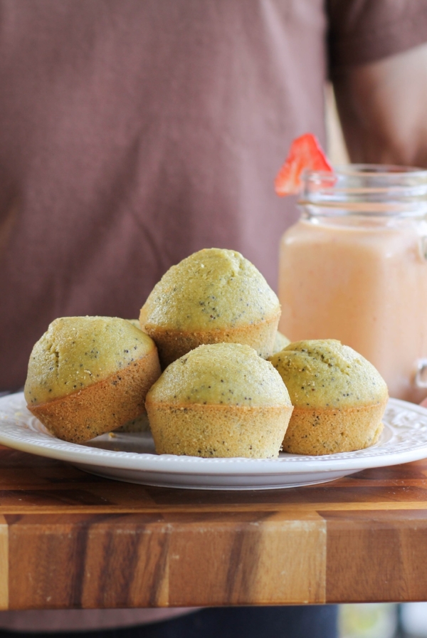 Plate full of lemon poppy seed muffins.