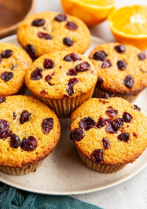 Cranberry orange muffins on a plate, ready to serve.
