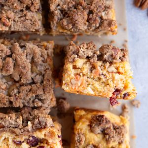 Slices of carrot cake coffee cake with the slices tipped up to see the carrot cake.