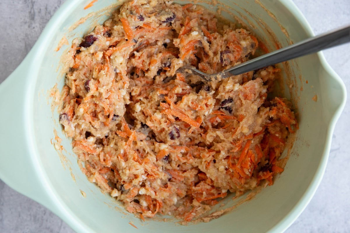 Mixing bowl with carrot cake batter, ready to be baked.