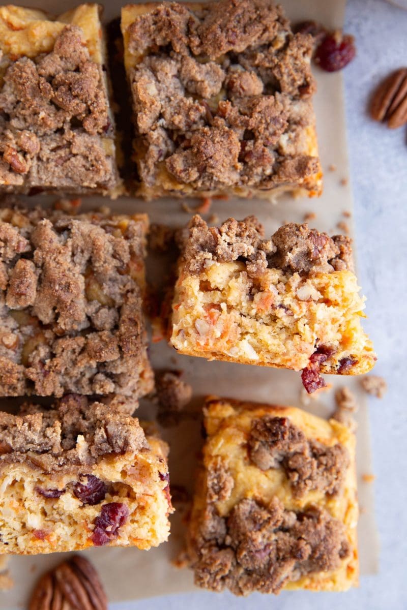 Slices of carrot cake coffee cake with the slices tipped up to see the carrot cake.