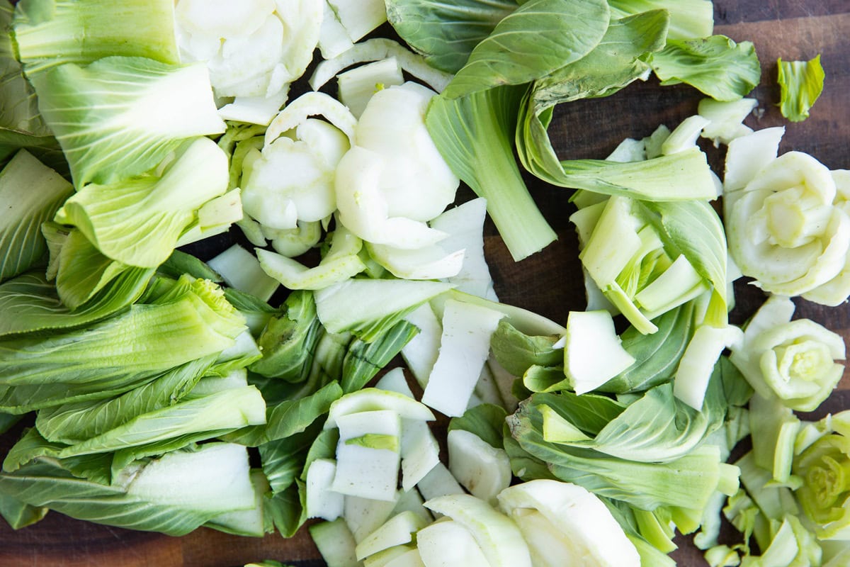 Cutting board with chopped bok choy.