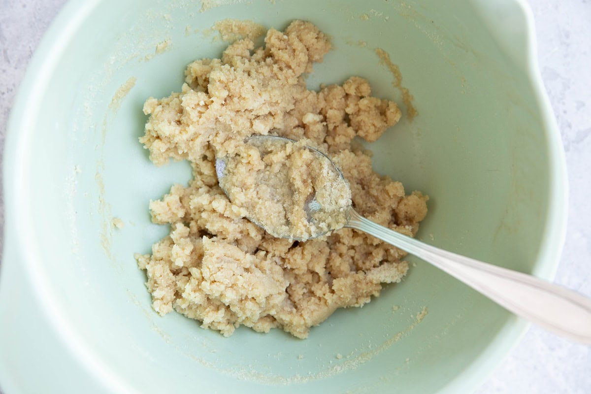 Mixing bowl with almond flour crumble topping.