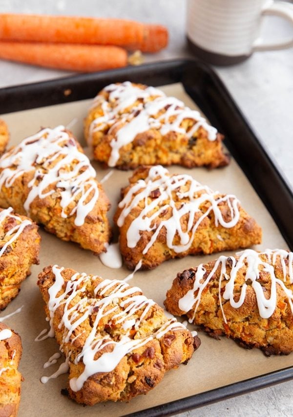 Sheet pan full of carrot cake scones.
