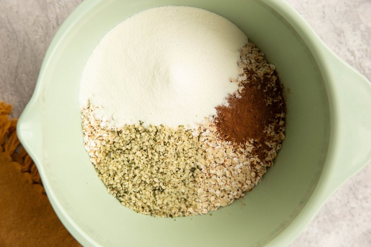 Dry ingredients for cottage cheese overnight oats in a mixing bowl.