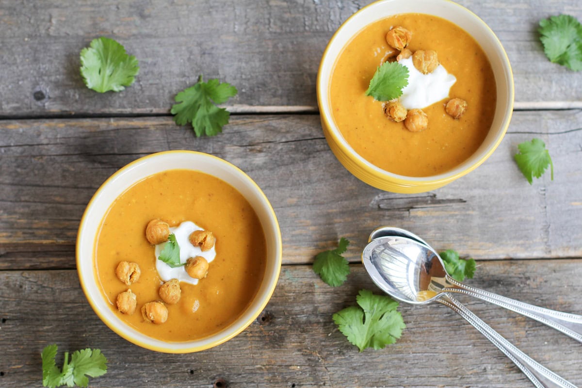 Two small ramekins full of sweet potato soup