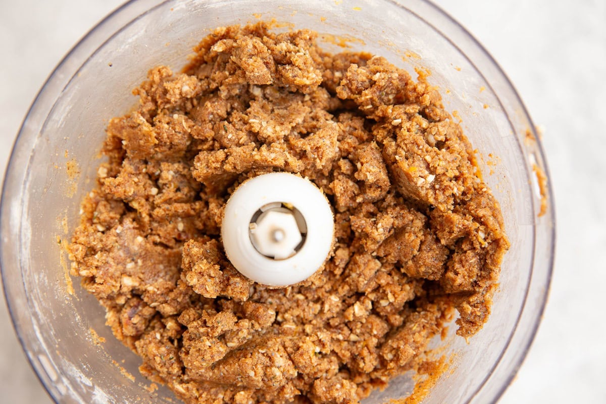 Energy ball mixture in a food processor, ready to make into bite sized balls.