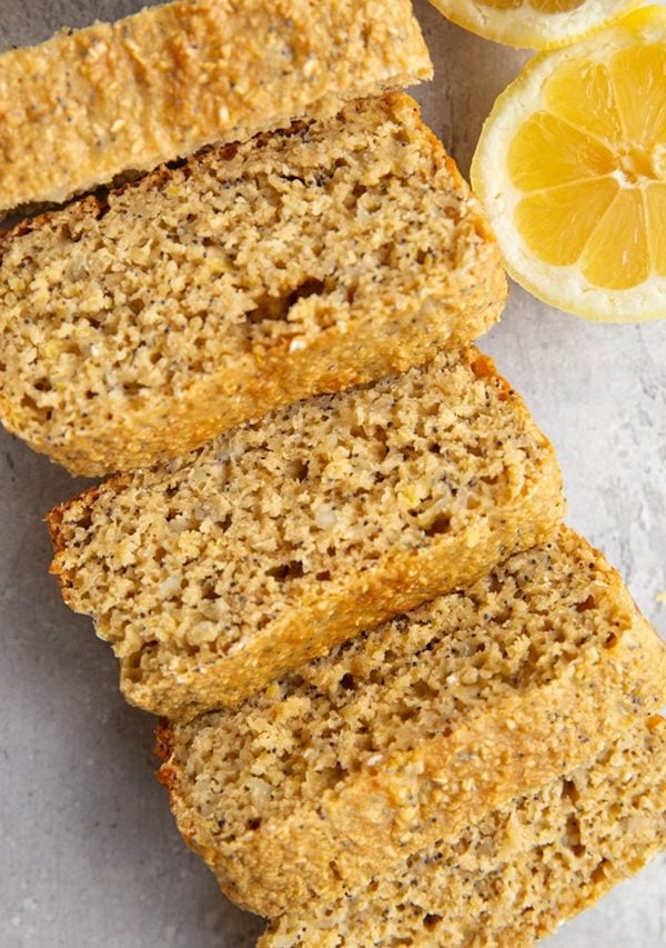 Lemon poppy seed bread cut into slices.