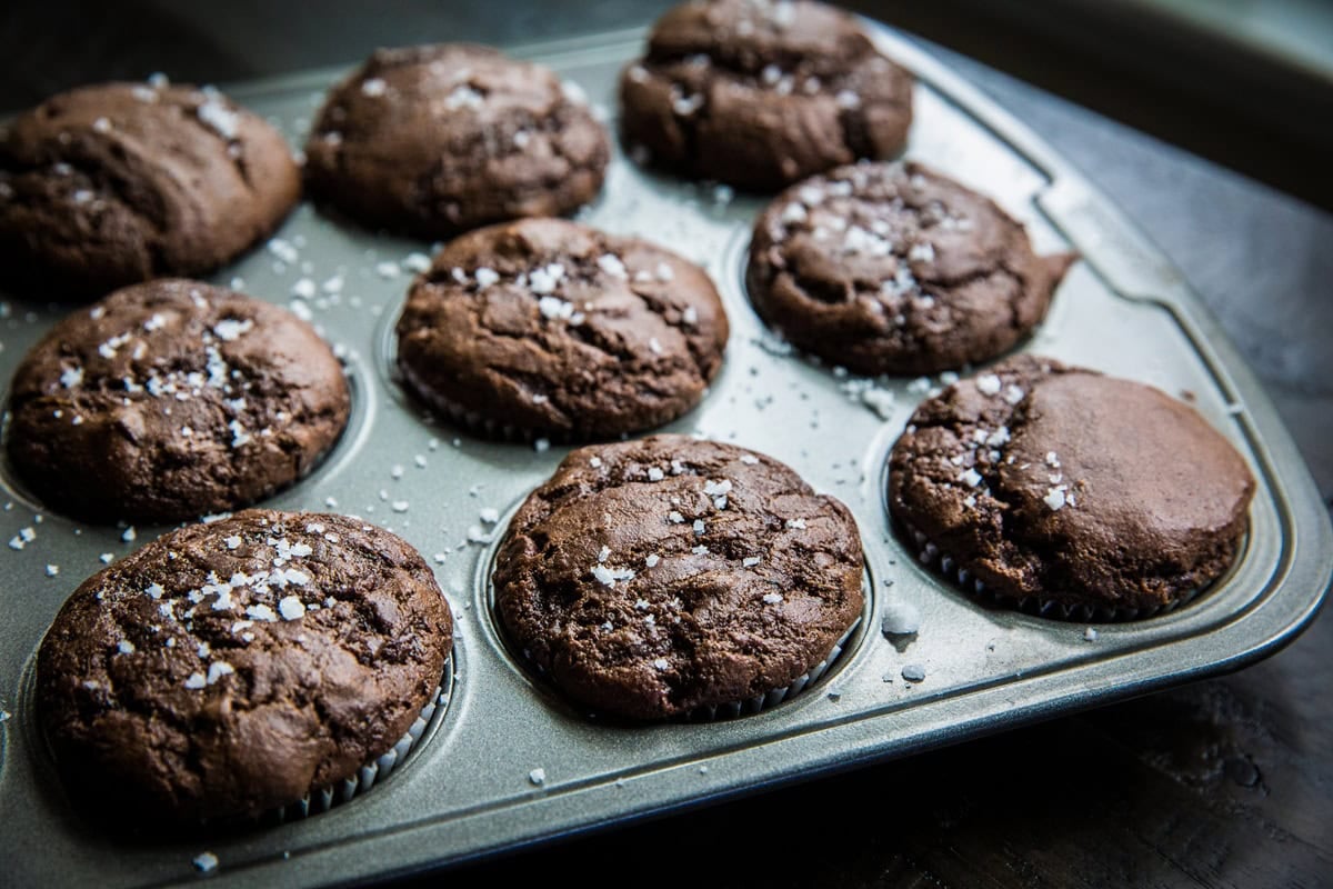 Muffin tray of chocolate zucchini muffins.