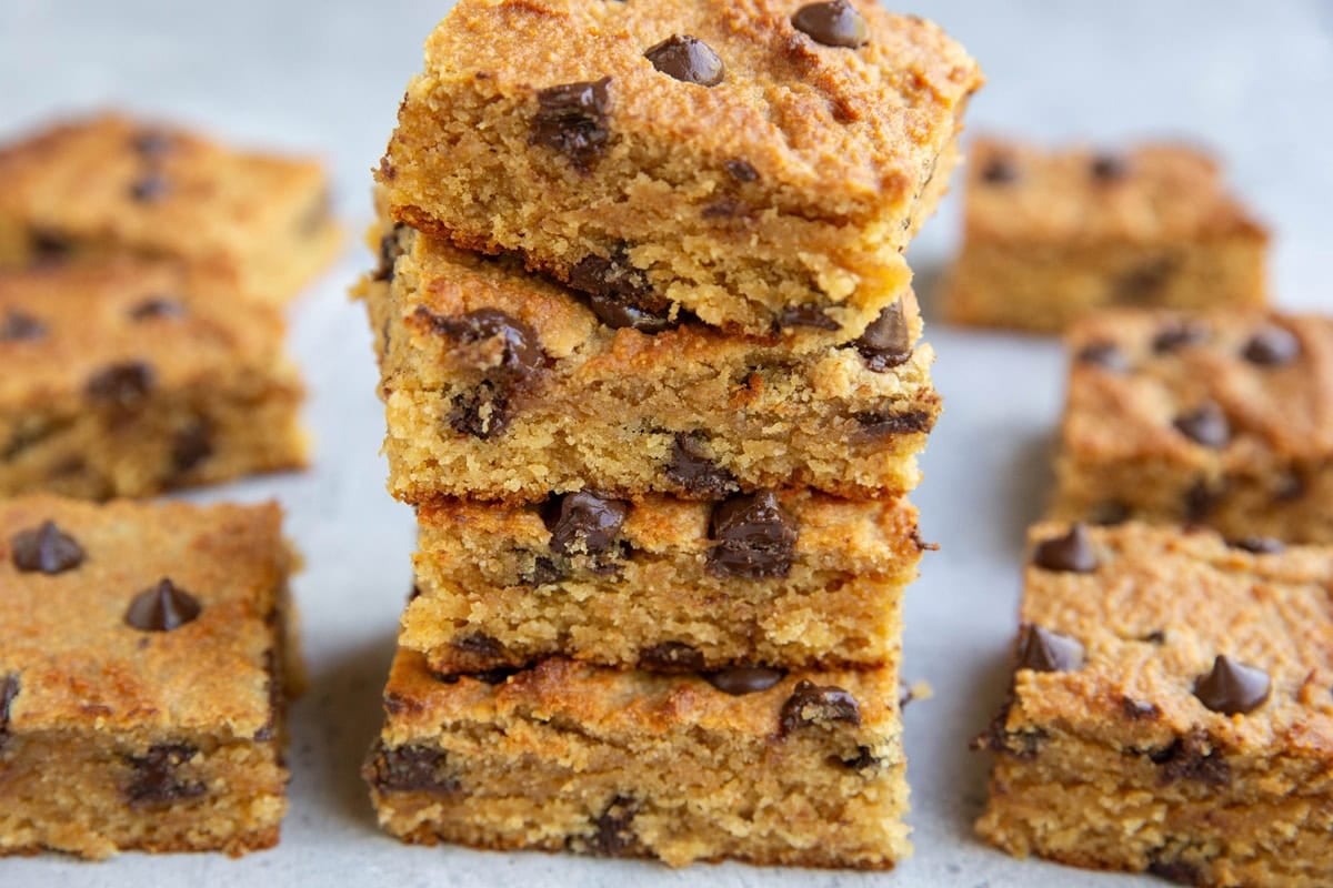 Stack of four peanut butter bars on top of each other.