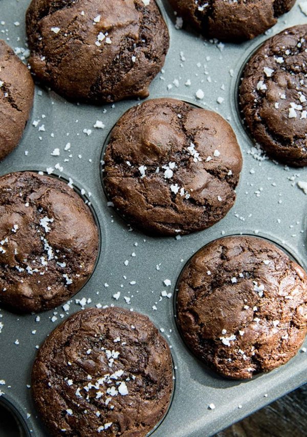 Muffin tray full of chocolate zucchini muffins