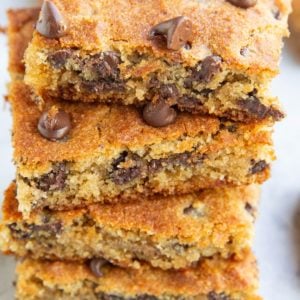 Chocolate chip cookie bars stacked on top of each other.