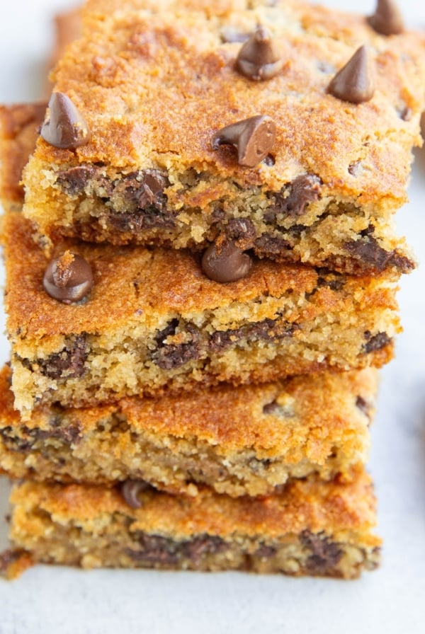 Chocolate chip cookie bars stacked on top of each other.