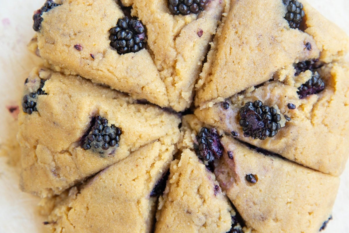 Scone dough cut into eight equal sized triangles.
