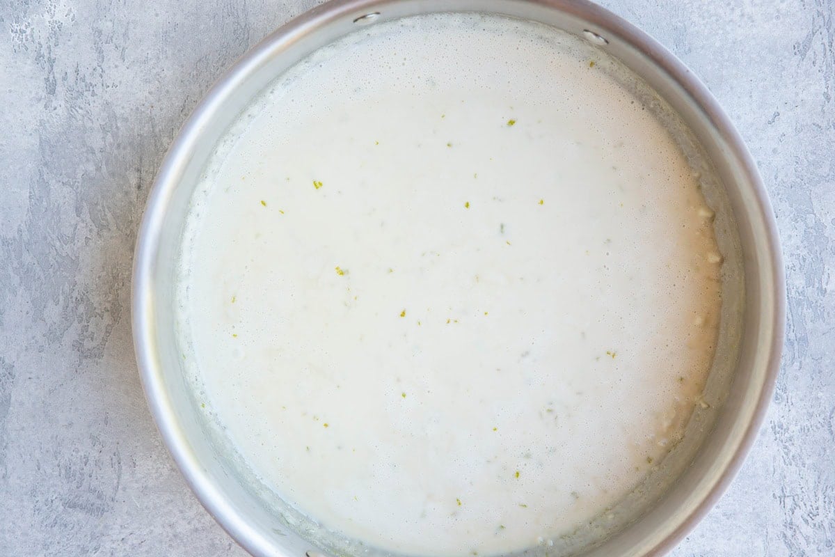 Coconut Lime Sauce in a skillet, ready to be used on salmon.