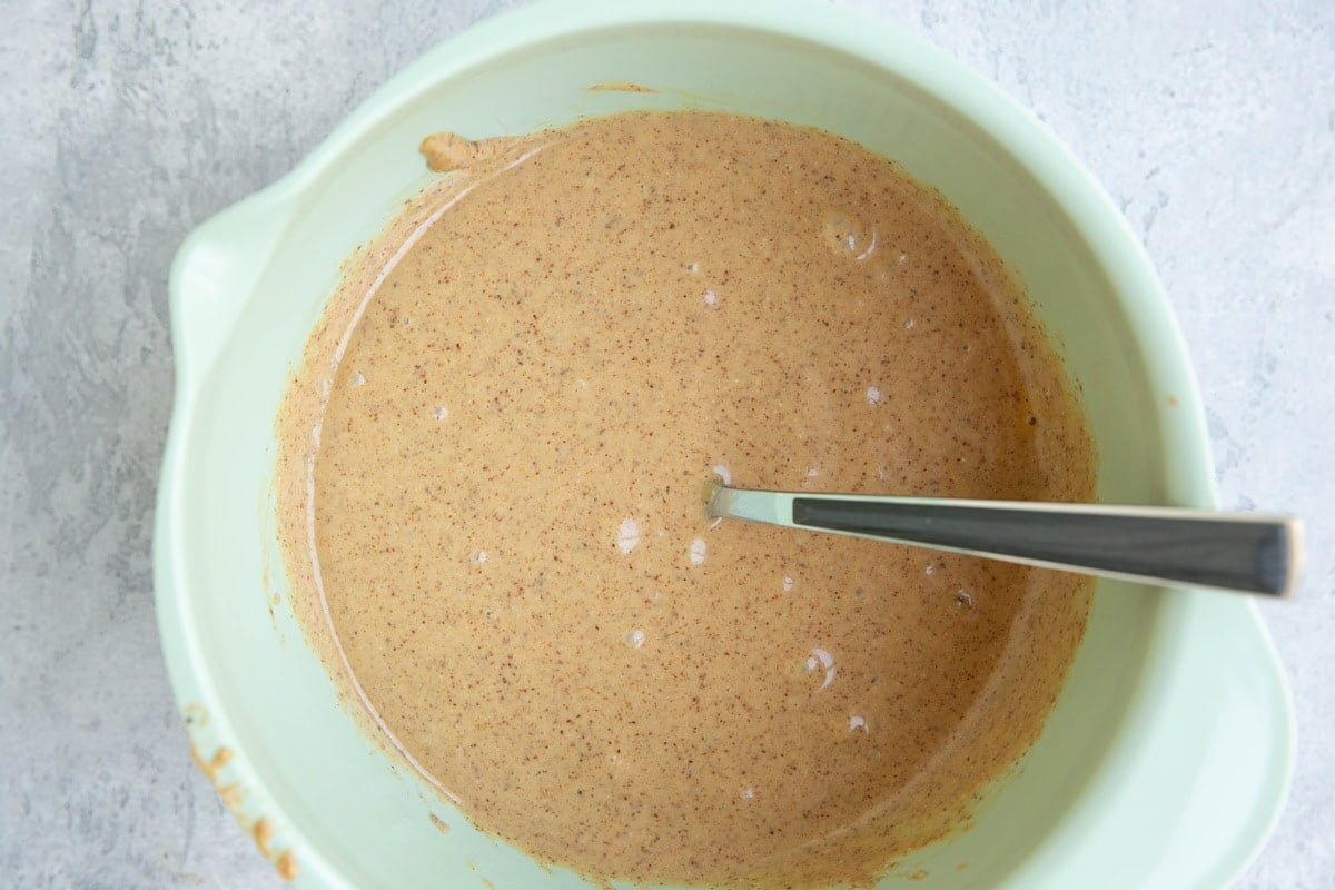 Mixing bowl full of wet ingredients.