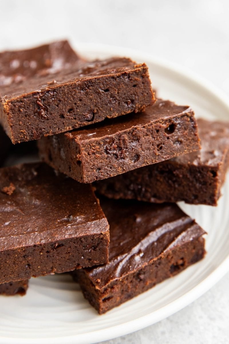 Plate of cottage cheese brownies cut into squares.