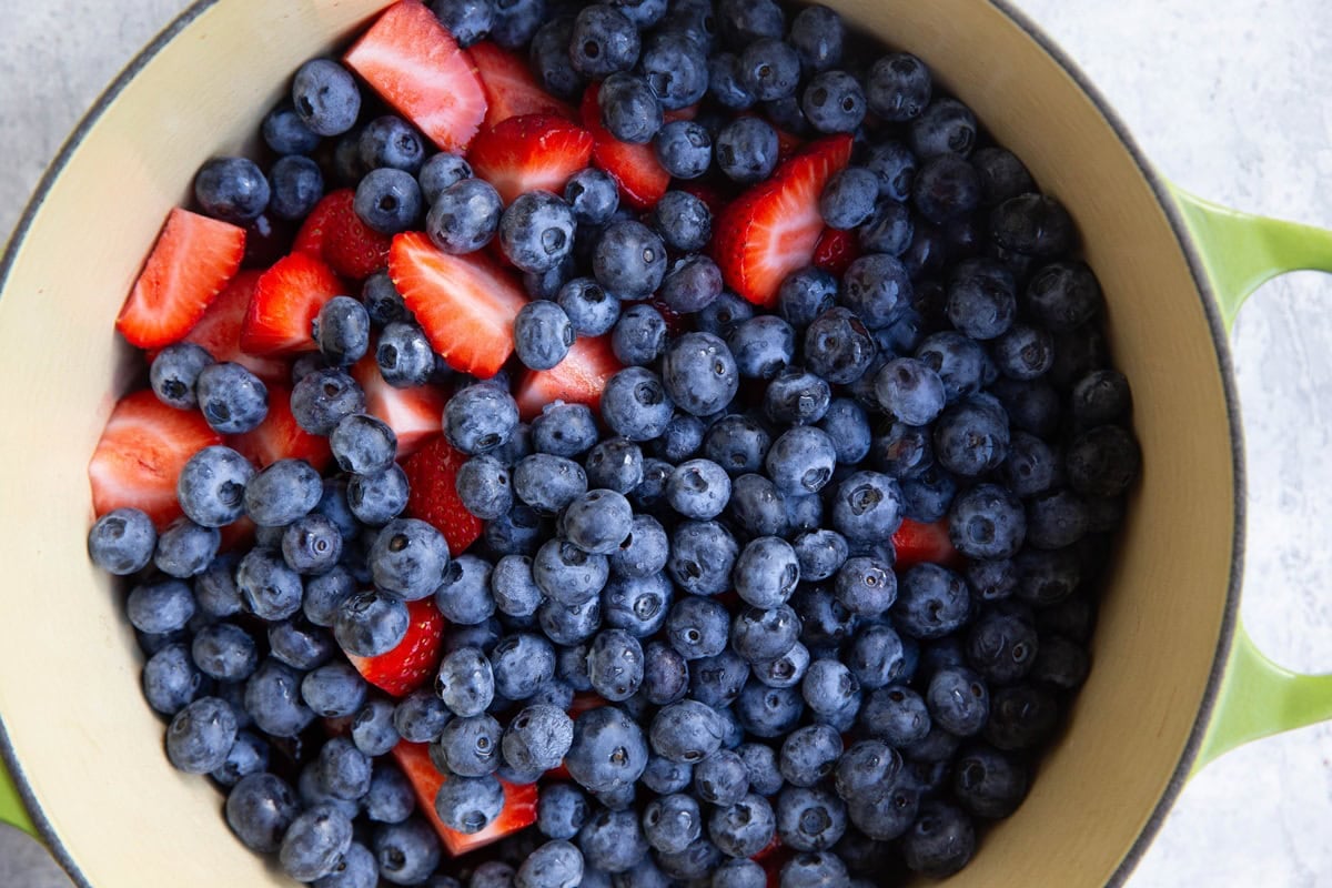 Large pot full of berries.