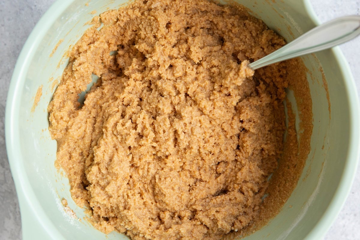 Mixing bowl full of pumpkin scone dough.