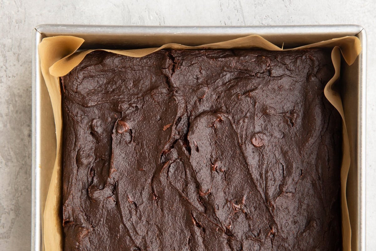 Pumpkin brownies in a baking dish, fresh out of the oven and ready to serve.