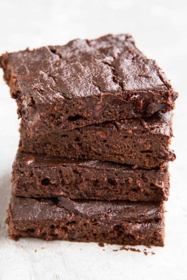 Stack of fudgy pumpkin brownies, ready to eat.