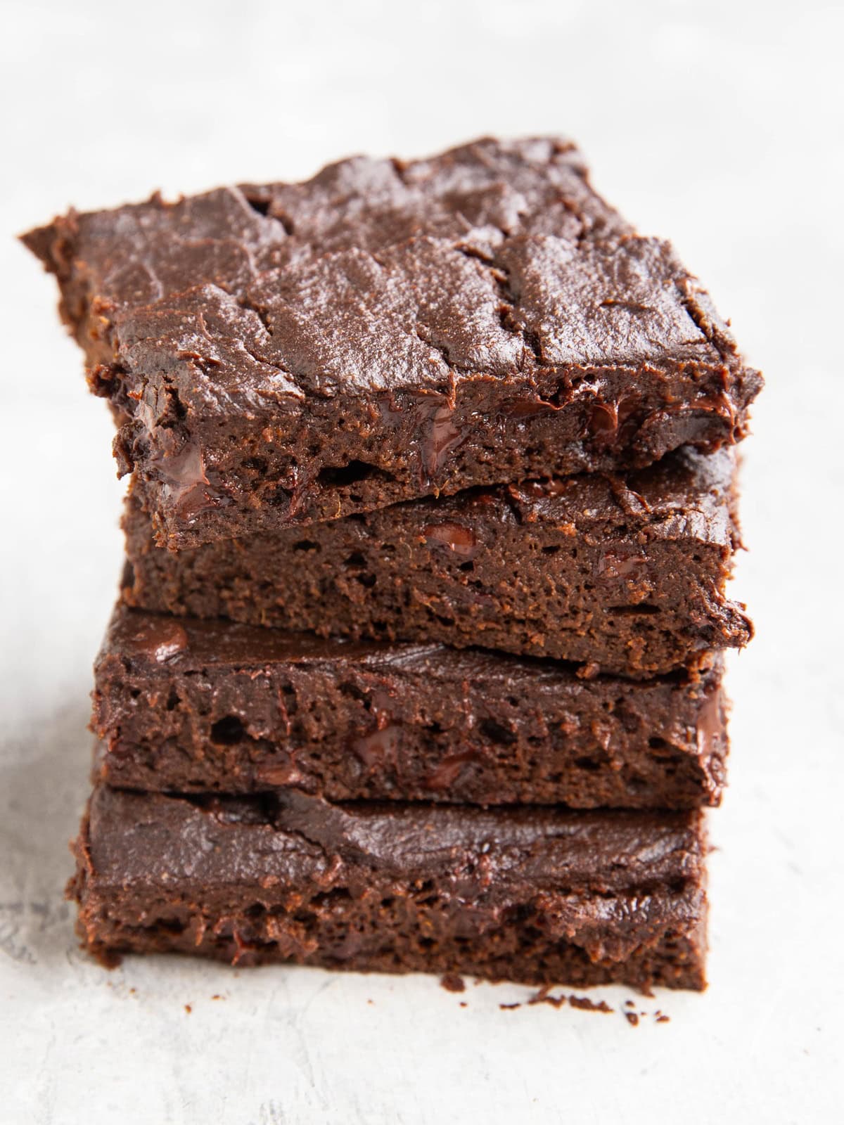 Stack of fudgy pumpkin brownies, ready to eat.